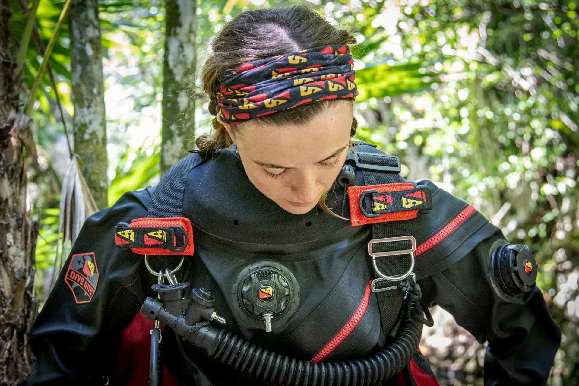Diver checking a configured Dive Rite harness and equipment